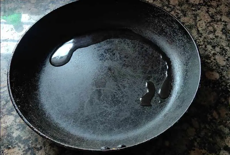 Seasoning Of Cast Iron With Coconut Oil Life Falcon